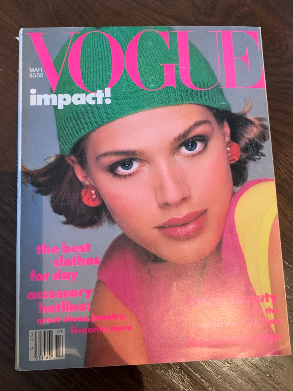 Vintage Magazine Cover Featuring Model in Green Beanie and Pink Top